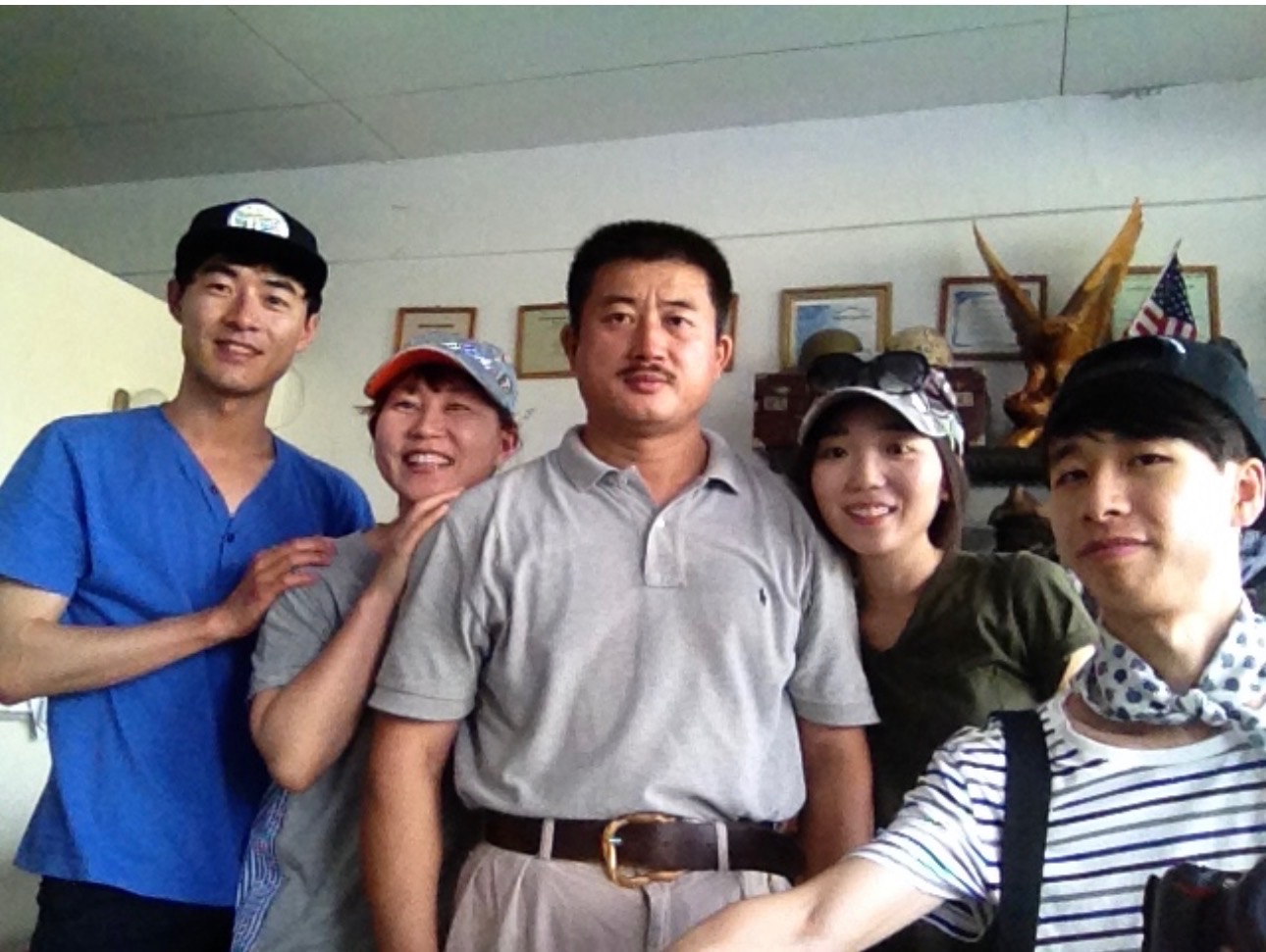 Guolong Wang with the patient and friends